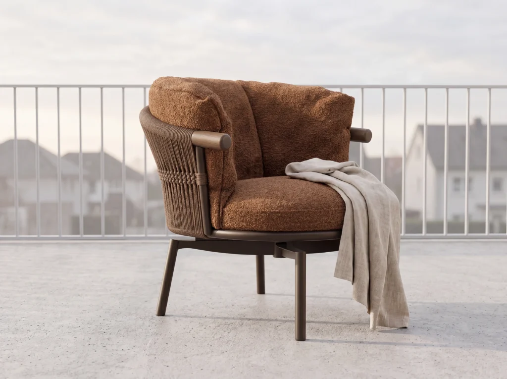 Sillón de exterior de cuerda tejida en color marrón oscuro mate con cojines Boucle color caramelo y reposabrazos de madera
